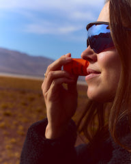 Freaks of Nature sun stick being applied to face for quick outdoor protection