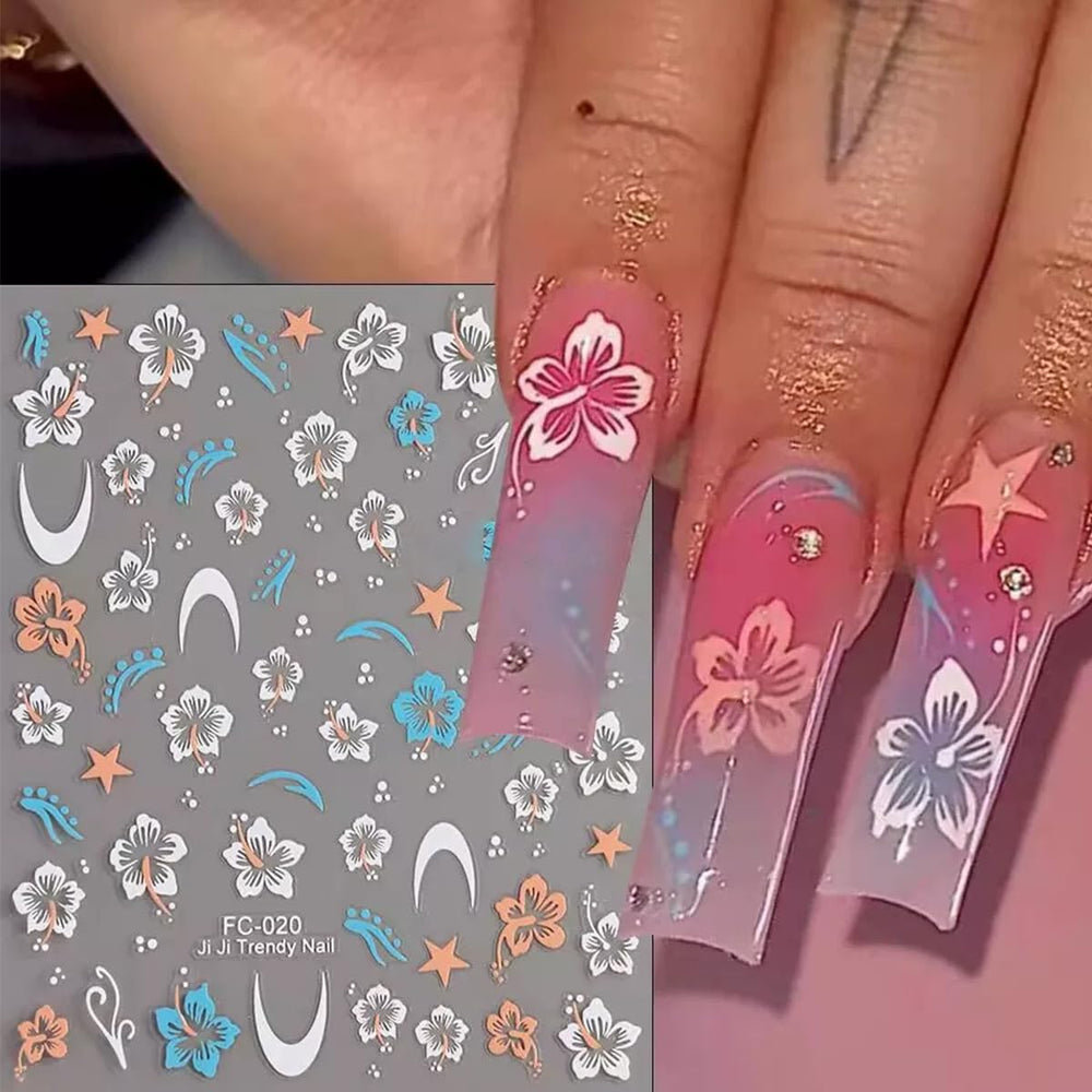 FSpronail lifestyle shot of finished manicure with hibiscus stickers adding tropical flair
