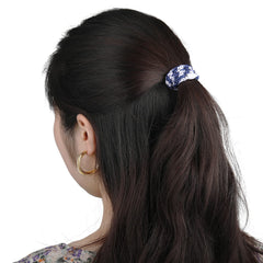 Funtopia hair tie holding a thick ponytail securely during exercise