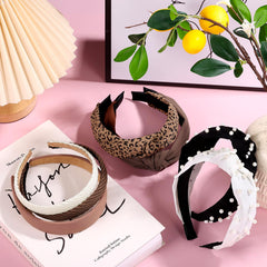 Funtopia headbands in a flatlay with outfit pieces illustrating styling versatility