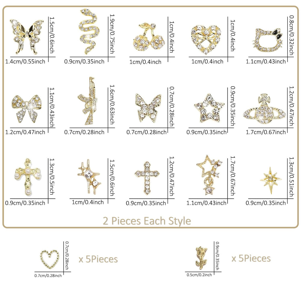Ganepwns charms on fingertip for scale showing compact size and precision fit