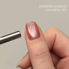 GAOY magnet held above nail forming cat-eye stripe for dramatic effect