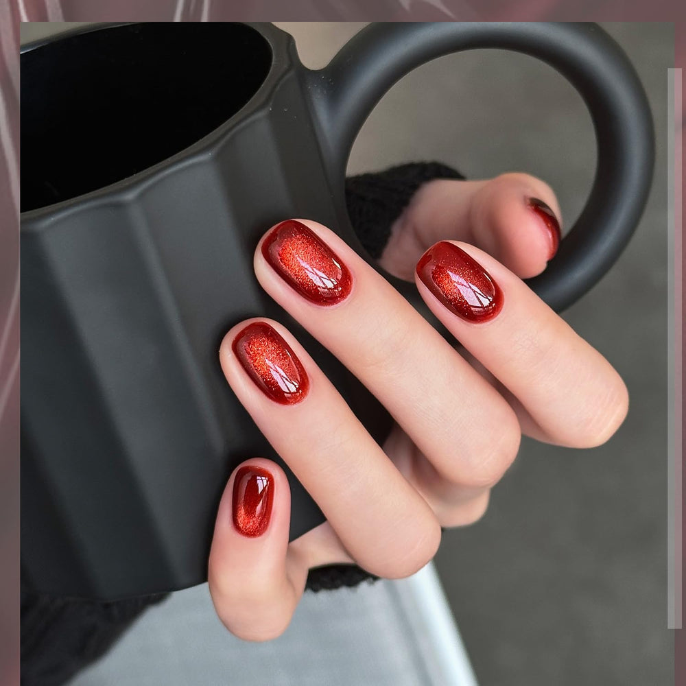 GAOY cat-eye magnet held above wet polish creating a reflective stripe pattern