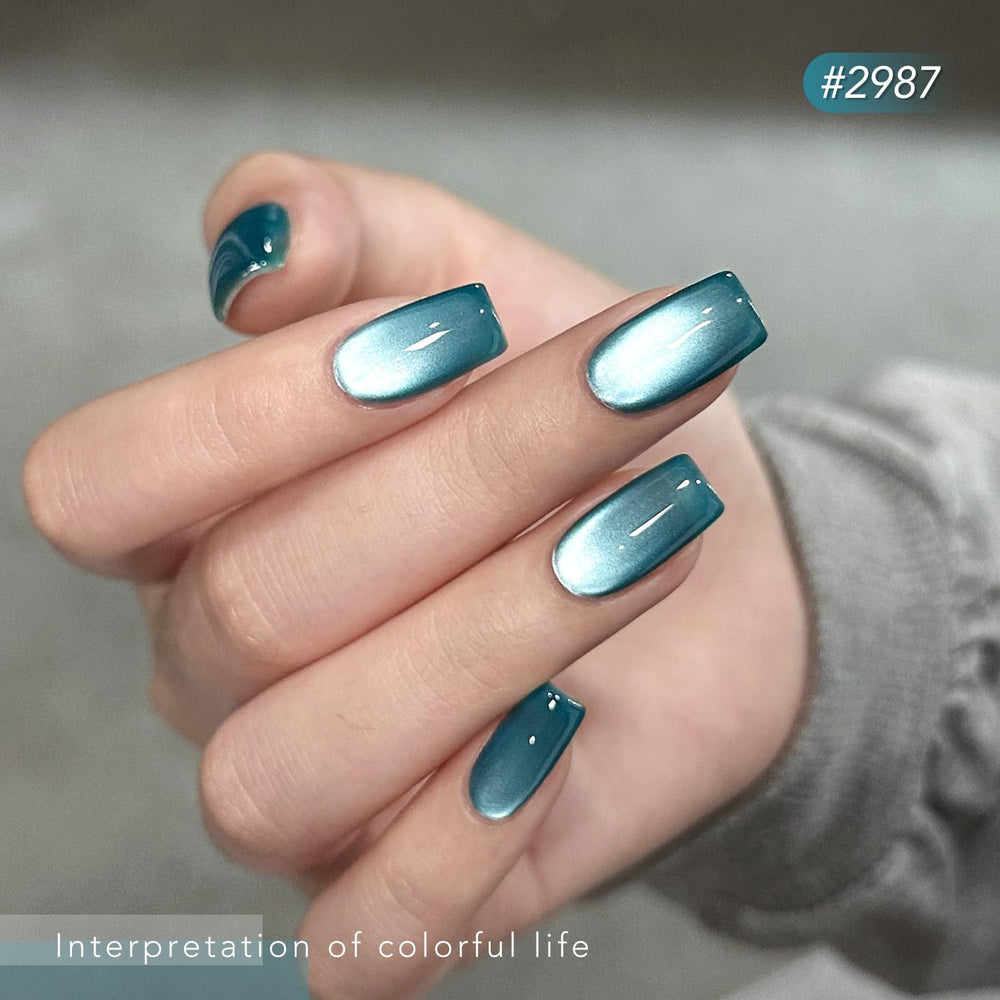 GAOY magnet held over uncured polish creating cat-eye stripe, demonstrates easy magnetic control benefit