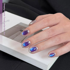 GAOY painted nails on hand showing shifting blue-purple sparkle for eye-catching wear