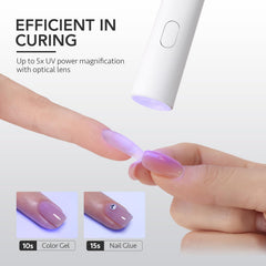 GAOY lamp held in hand demonstrating portable size and easy one-handed control