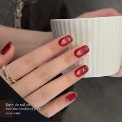 GAOY swatch on fingers showing finished Velvet Wine manicure with reflective depth advantage