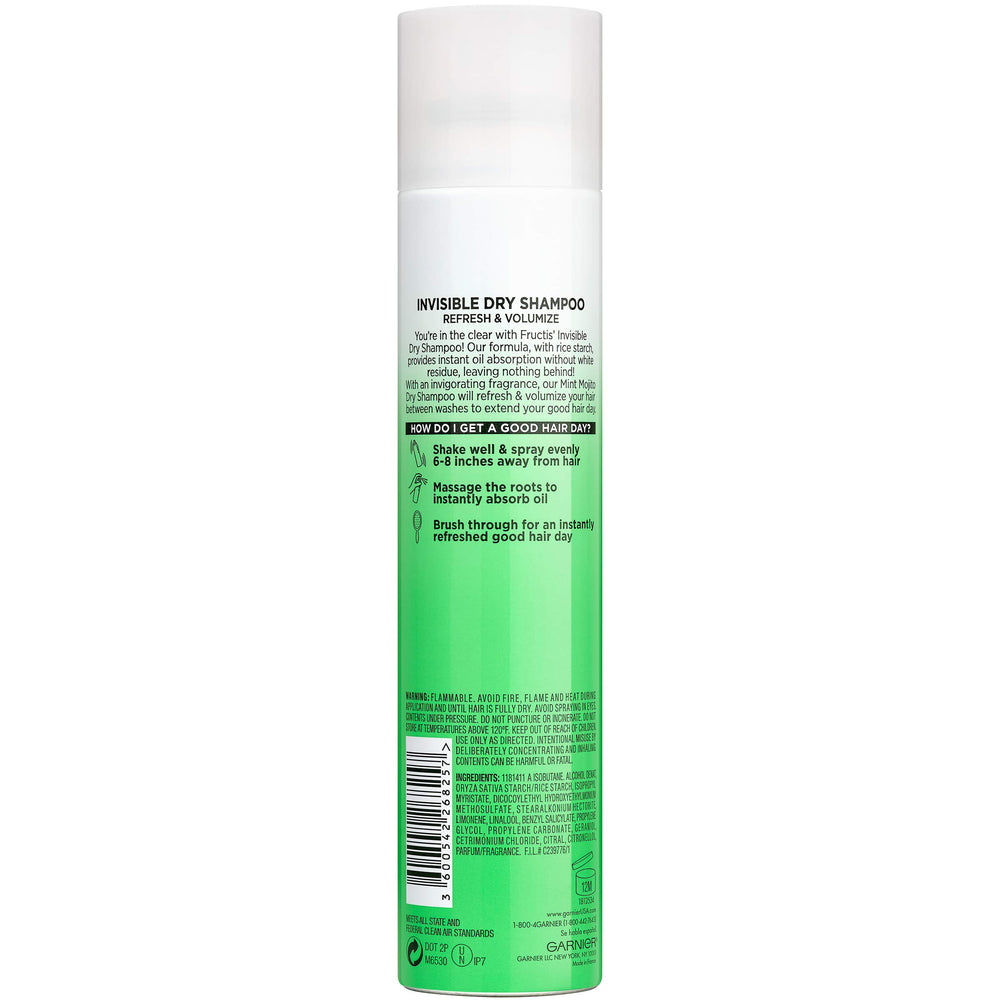 Garnier Fructis cans on bathroom shelf lifestyle scene showing travel-friendly benefit