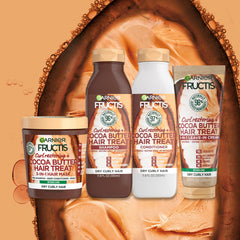 Garnier Fructis 200ml tube next to a hand for scale showing travel-friendly size and daily use benefit