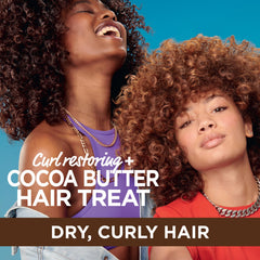 Close-up of Garnier Fructis cocoa butter cream texture highlighting creamy moisture and spreadability