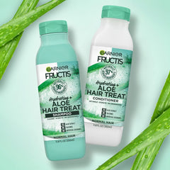 Garnier Fructis applied in wet hair demonstrating detangling benefit