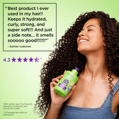 Garnier Fructis size comparison beside a hand to show 10.2 fl oz scale