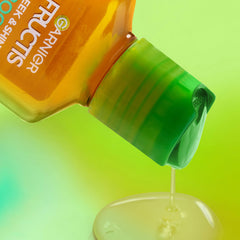 Garnier Fructis sleek & shine in a travel bag highlighting portable bottles for on-the-go smoothing