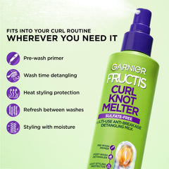 Garnier Fructis spray mist in hand for even application and control