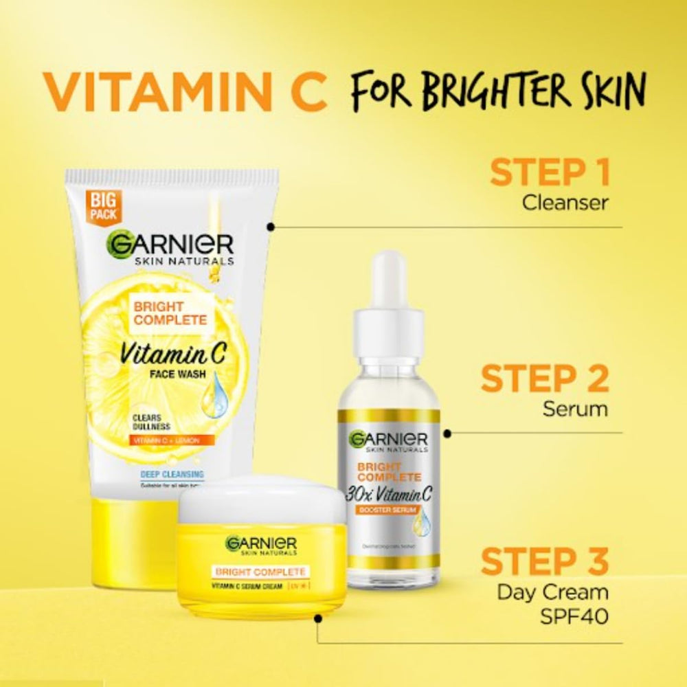 Garnier tube in hand for scale showing compact portable size