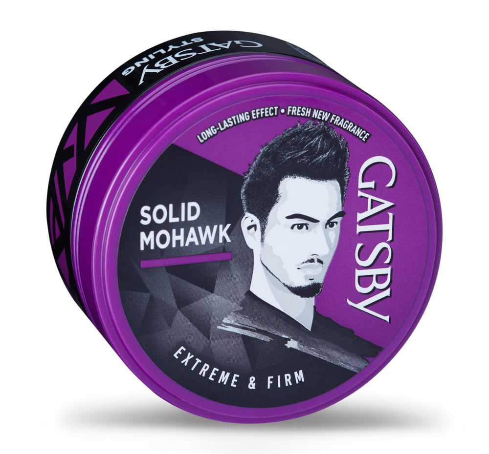 Gatsby styled mohawk on model illustrating firm hold and flexible finish