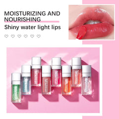 GECOMO lip oil swatch on hand showing sheer pearly shine and smoothing effect