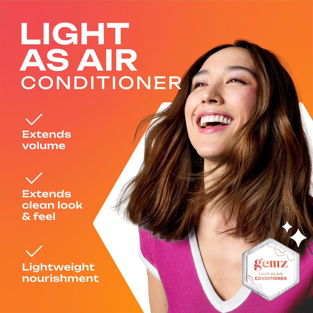 gemz shampoo lather in hands demonstrating quick water activation and rich foam