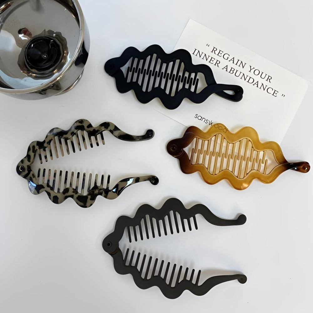 Generic four-clip set in box showing gift-ready packaging and variety
