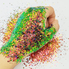 Generic chameleon glitter next to ruler for scale showing jar size and travel-friendly benefit