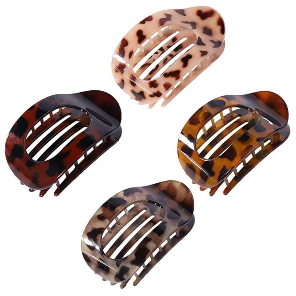 Generic front view of four flat claw clips showing colors and matte finish benefit