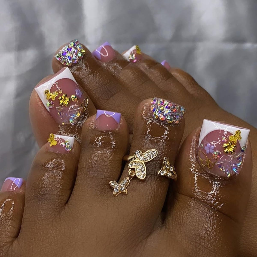 Generic front packaging showing white French tips and butterfly design, highlights complete kit benefit
