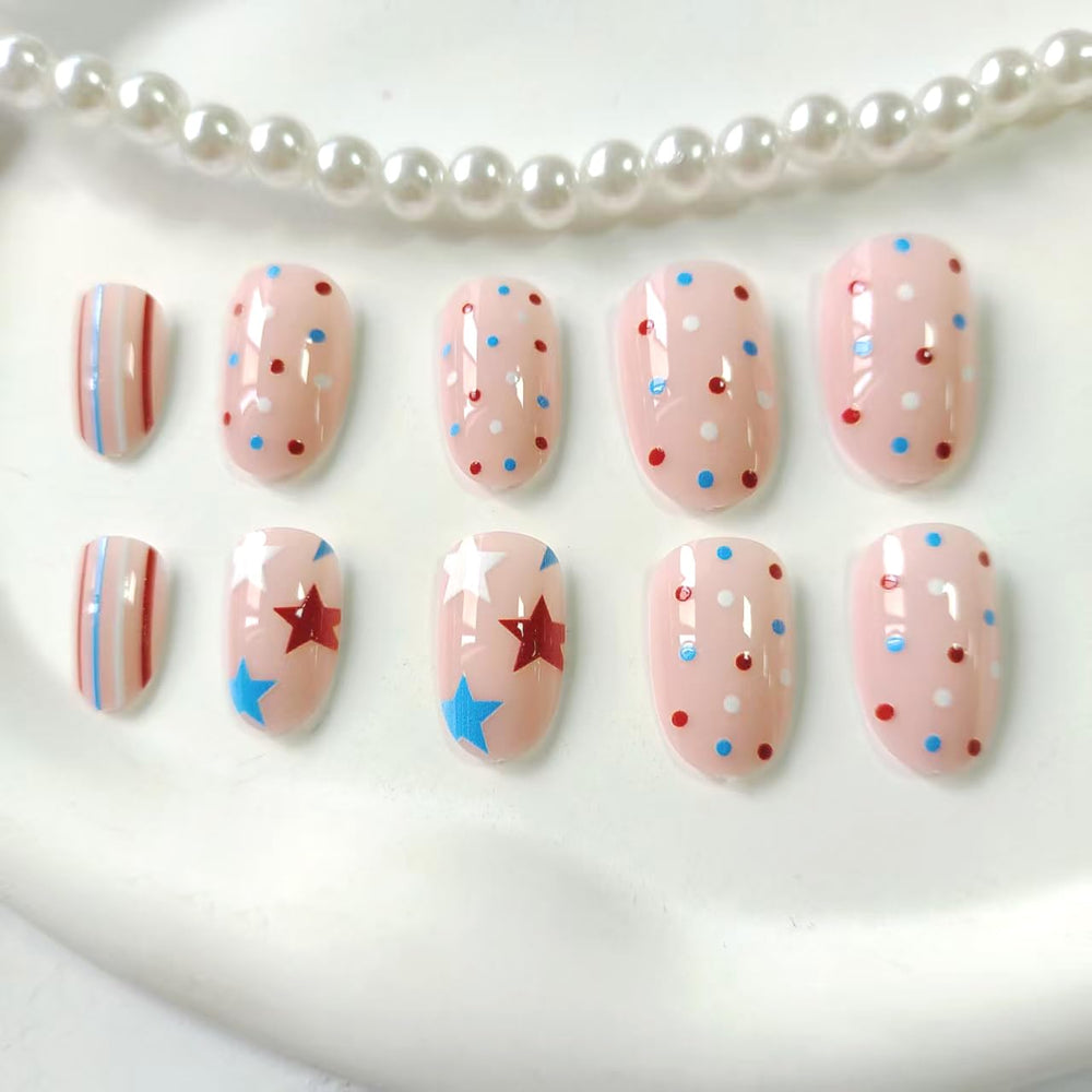 Generic hands wearing the press-on nails at a barbecue showing easy party-ready benefit