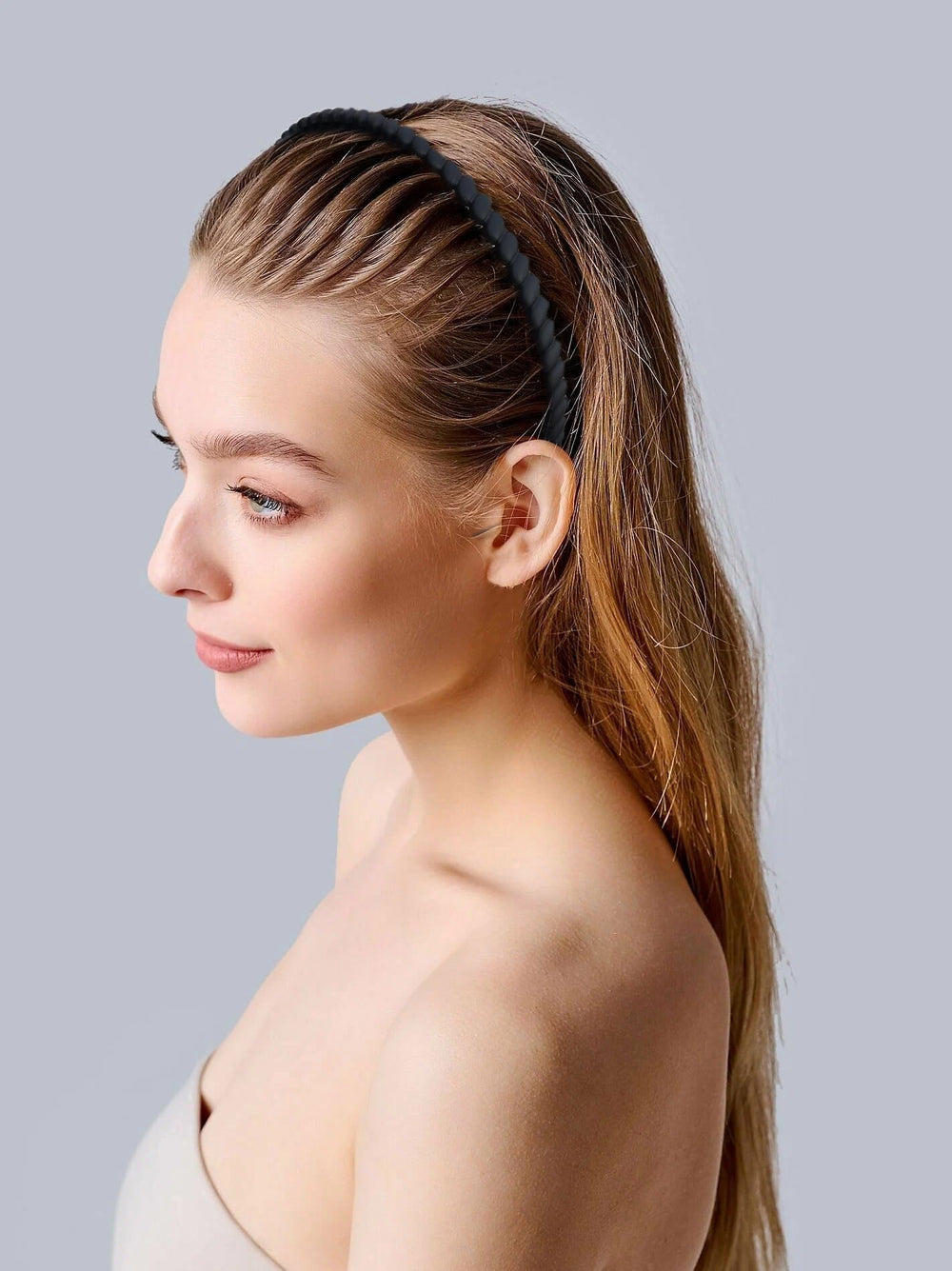 Generic brand headband worn during workout keeping hair controlled and comfortable