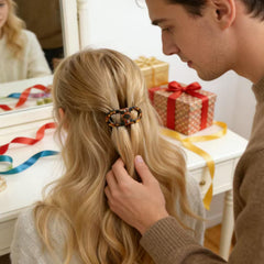 Generic magnetic hair clip beside coin showing lightweight portability