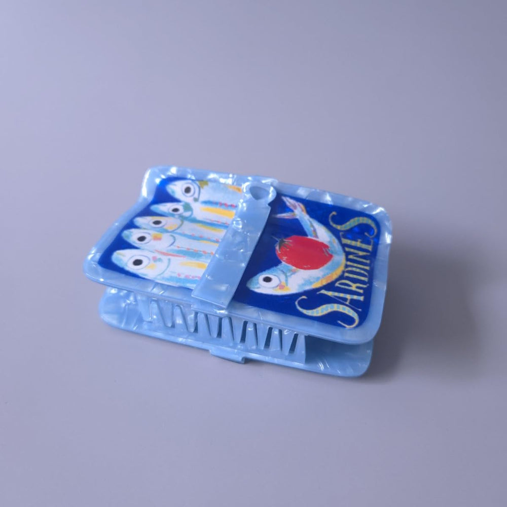 Generic sardine can clip in hair usage holding a bun with stable, no-slip benefit