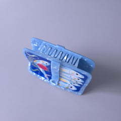 Generic sardine can clip on bathroom counter showing easy-to-wear grooming benefit
