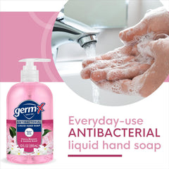 Germ-X pump being pressed at a kitchen sink for quick hand washing