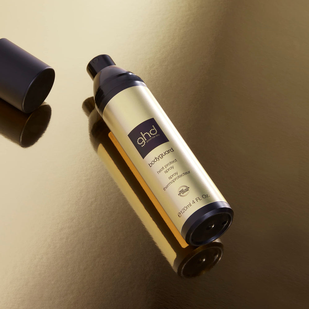 ghd Bodyguard next to ruler showing 1.7 fl oz travel-friendly size