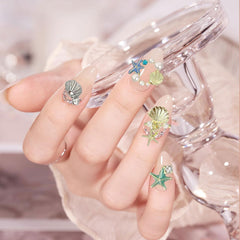 Gieehiol charms on nail tips demo illustrating application and visual impact