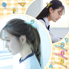 Giegxin clips arranged on notebook in back-to-school scene adding cheerful accents