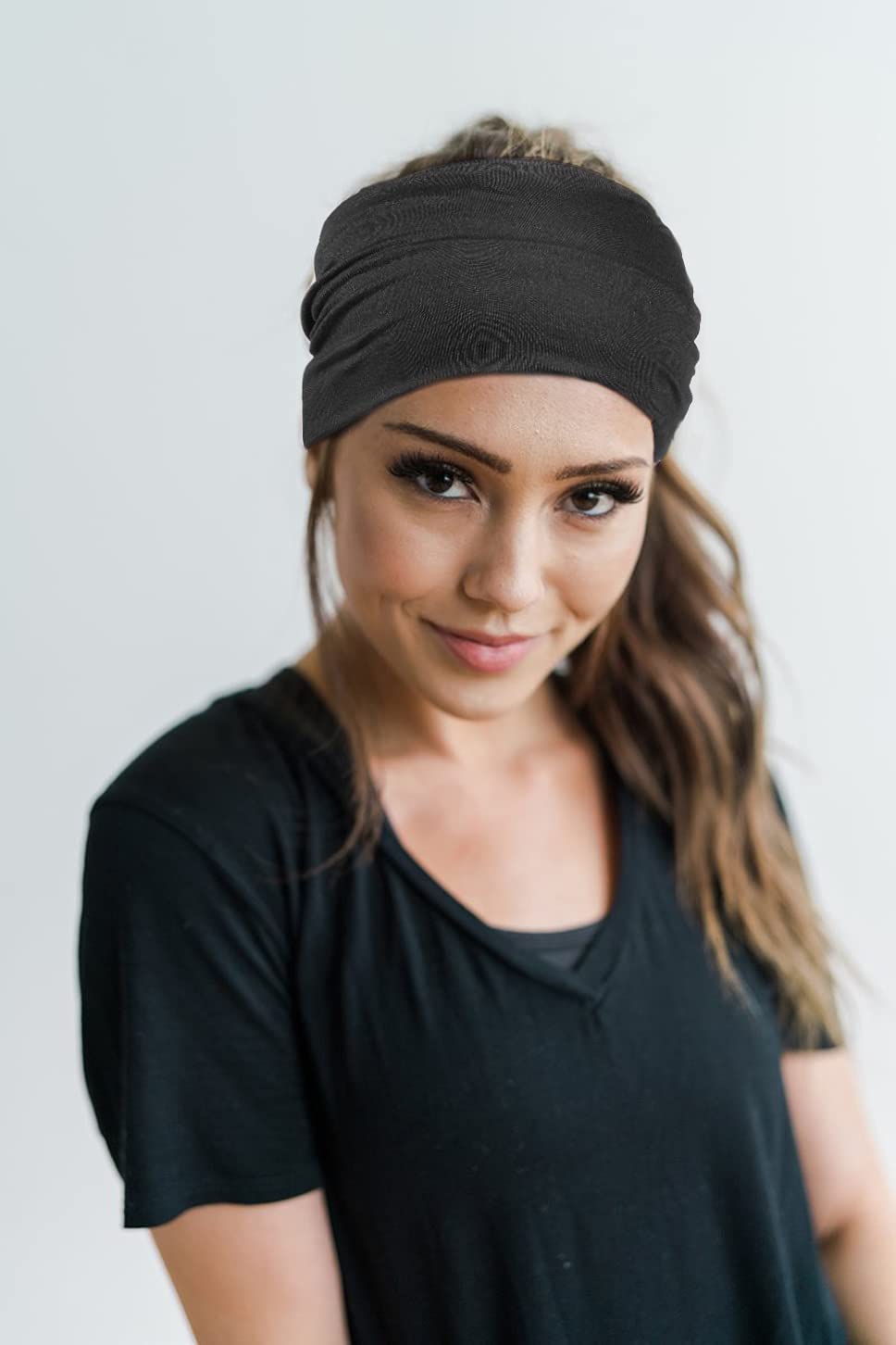 GiLi model wearing headband during yoga — keeps hair and sweat away