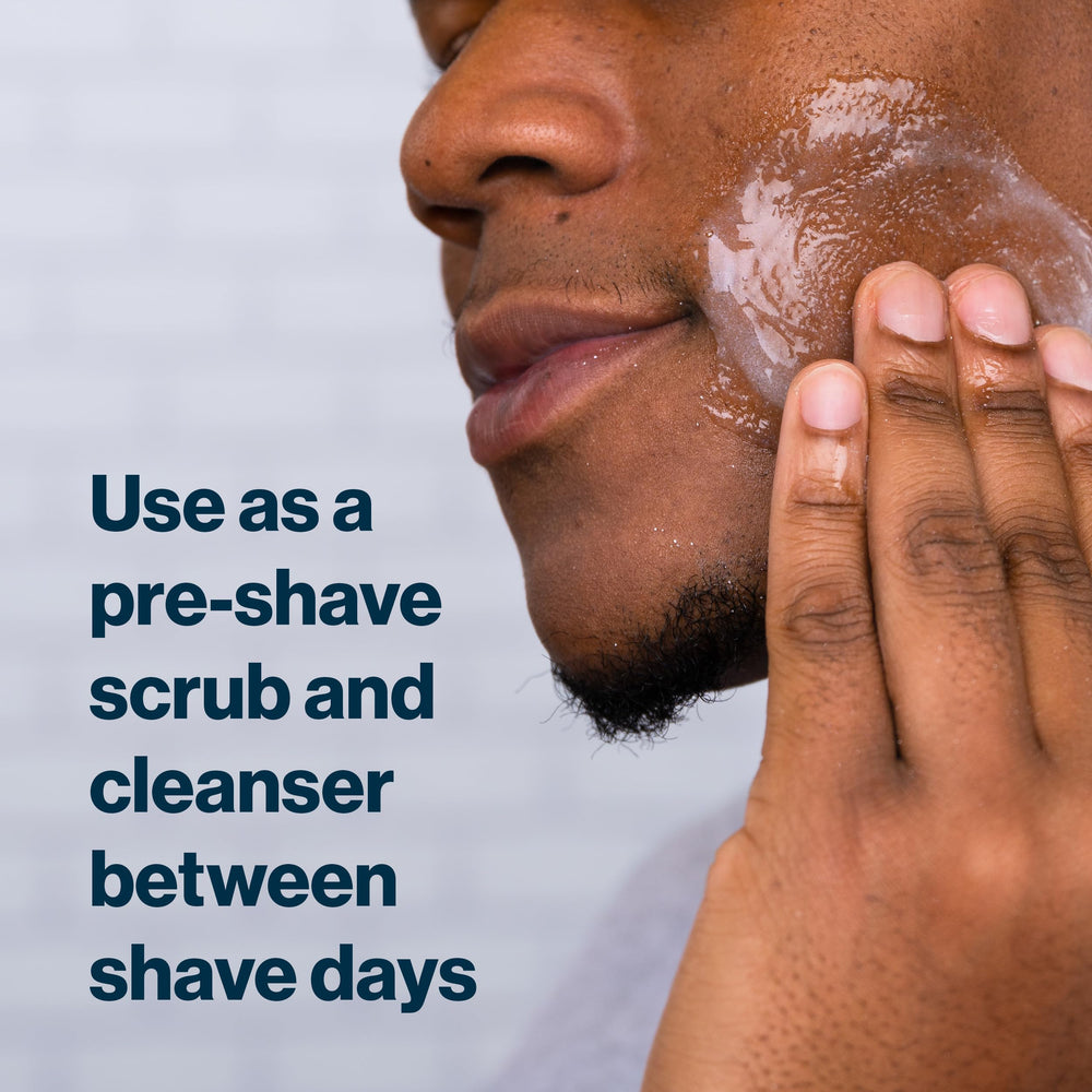 Close-up of Gillette SkinGuard scrub texture showing charcoal granules for deep cleaning