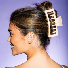 GIMME Beauty clip held in hand showing extra-large size for thick hair