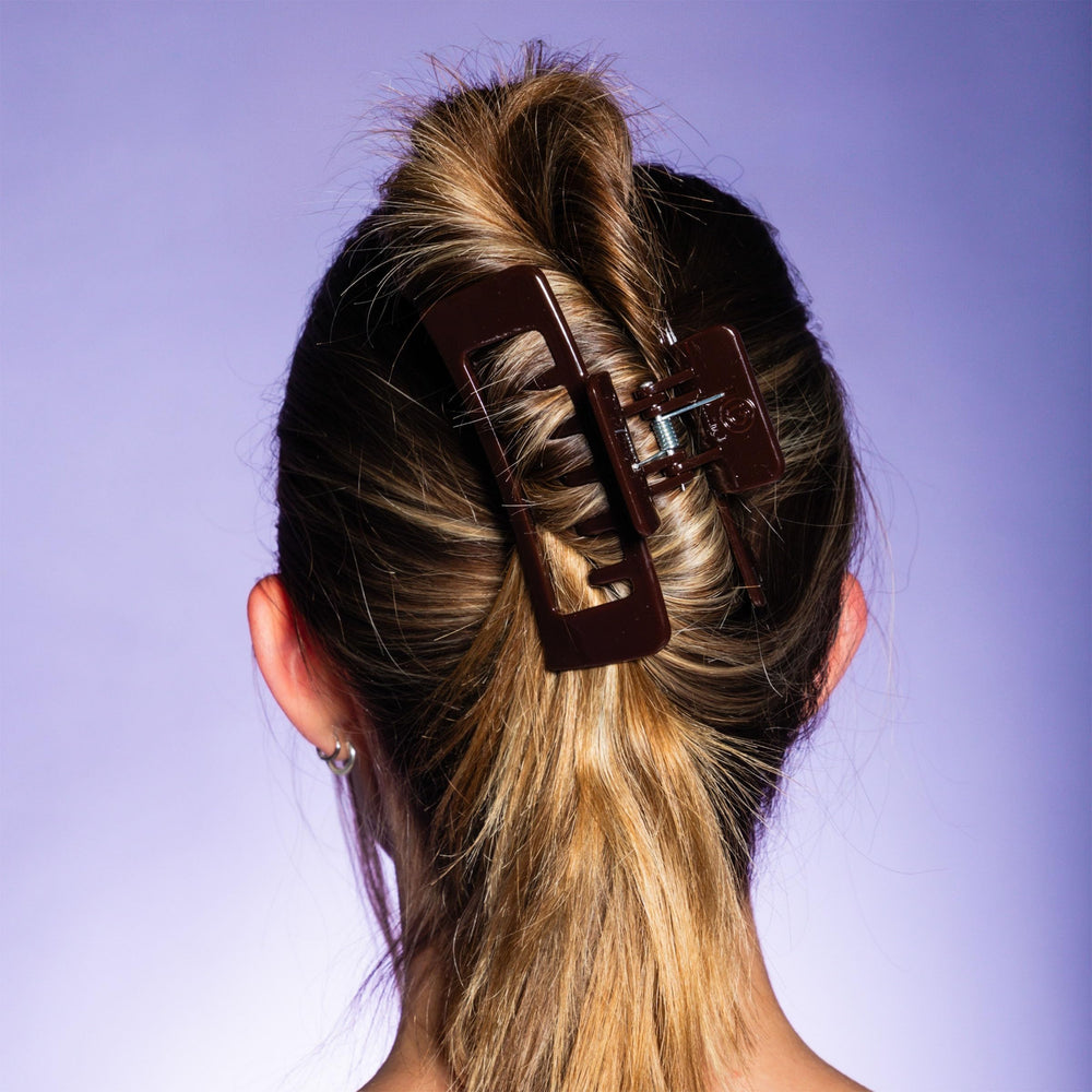 GIMME clip holding a half-up style to show quick styling benefit