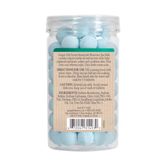 Ginger Lily Farms spa ball dissolving in a manicure bowl for easy use