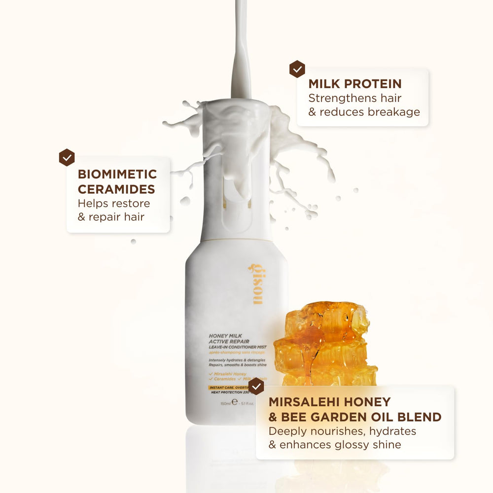 Applying Gisou to damp hair to detangle and soften strands