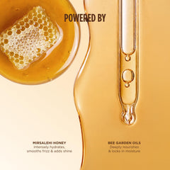 Gisou bottle beside hand for scale showing compact travel-friendly size benefit