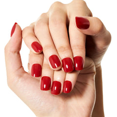 GLAMERMAID hands applying adhesive tab demonstrating quick gentle attachment