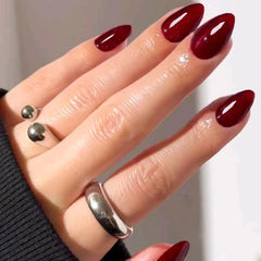 GLAMERMAID nails in hand for scale, demonstrating short almond practicality and comfort