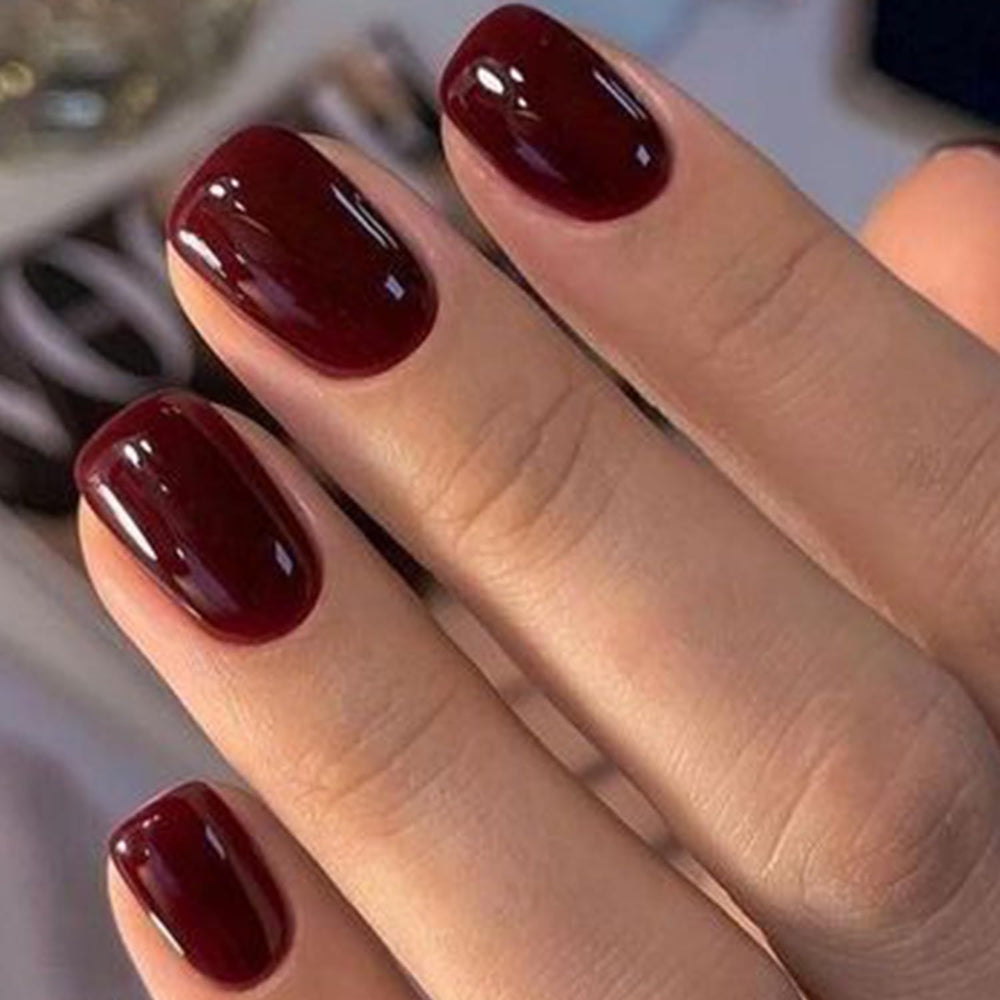 GLAMERMAID nails worn in a lifestyle shot for event-ready elegance