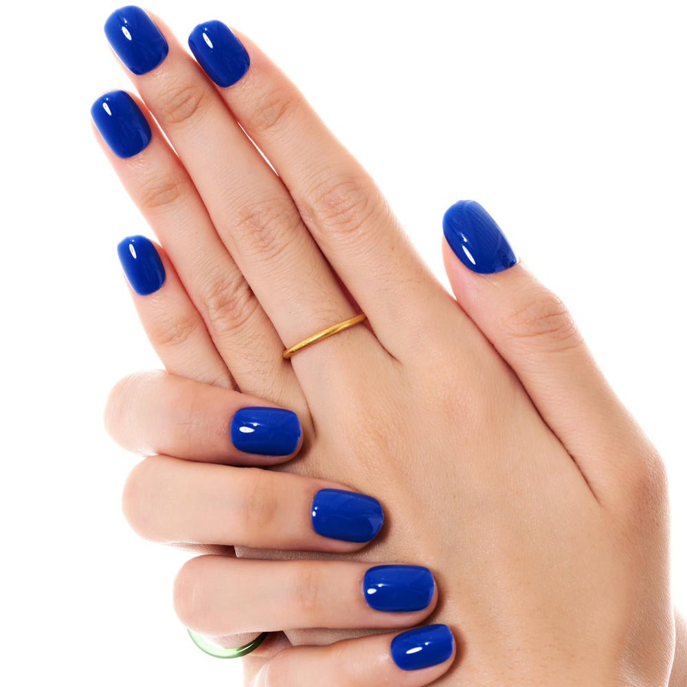 GLAMERMAID nails beside ruler illustrating extra-short length for natural look