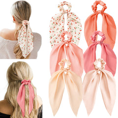 Glaudmeiss front view of six cherry-pink bow scrunchies showing neat presentation and charm