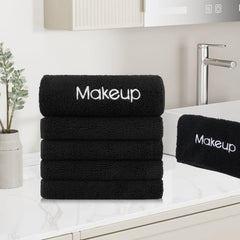 GLIMGLINT cloth held in hand showing 13x13 inch size for full-face coverage benefit