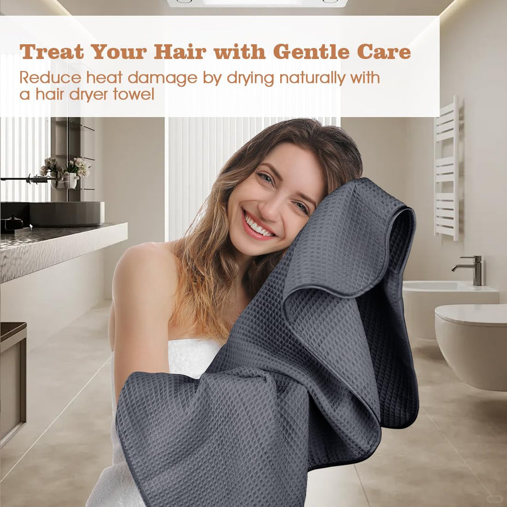 GLIMGLINT towel wrapped on curly hair demonstrating frizz control benefit