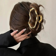 GLINLS in use holding thick hair bun for reliable all-day wear